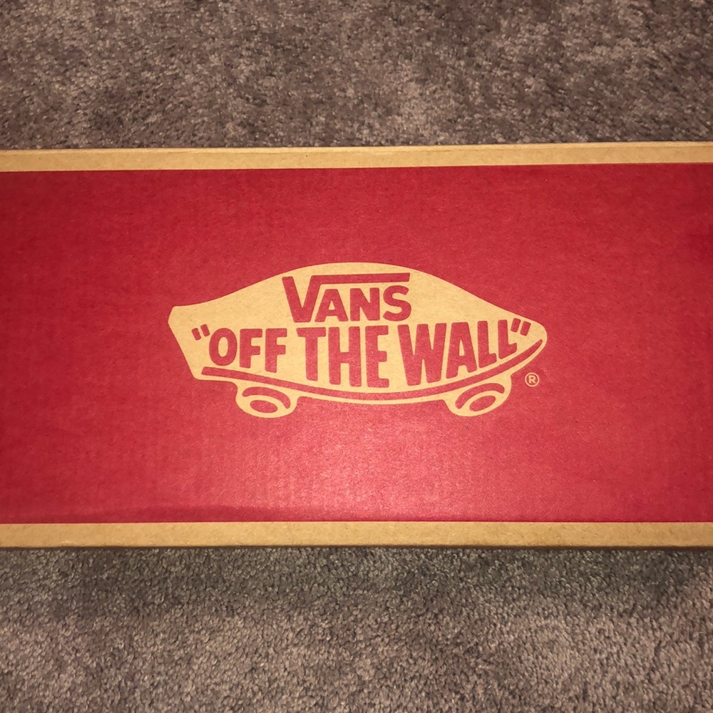 Never worn classic slip-on true white vans.